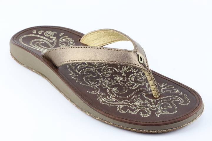 Dames  Slippers Olukai Paniolo 20129.Bronze/Dk Java. Direct leverbaar uit de webshop van Reese Schoenmode.